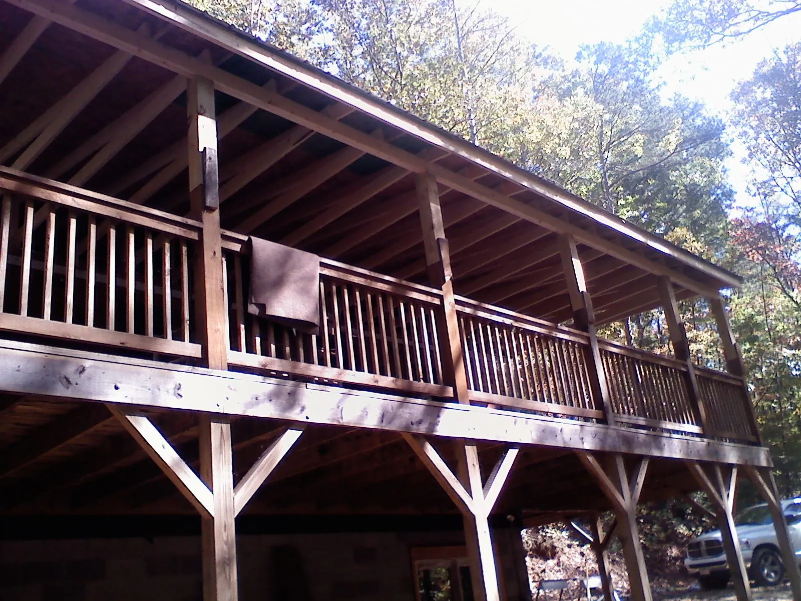 Timber framing under a new elevated porch and deck — Roof Leak Repair in Argyle by Roofing Brothers